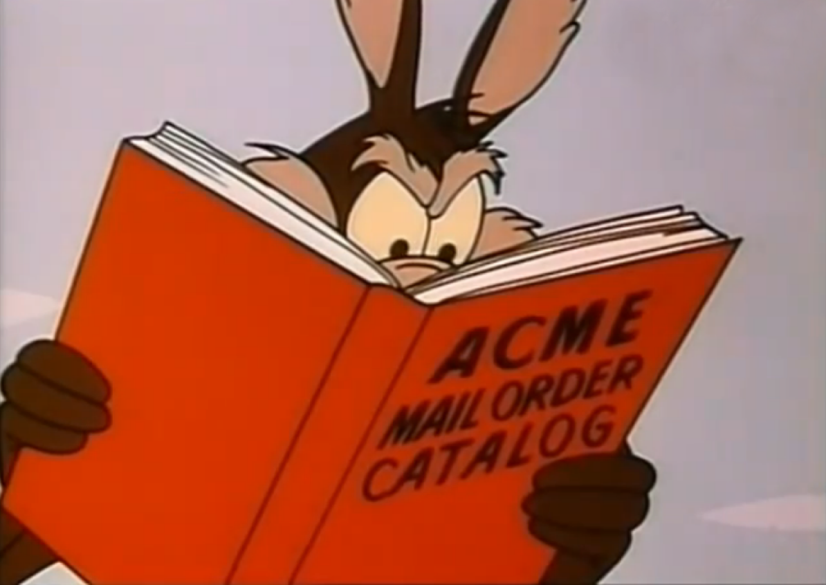 Wile E. Coyote reading ACME's Mail Order Catalog